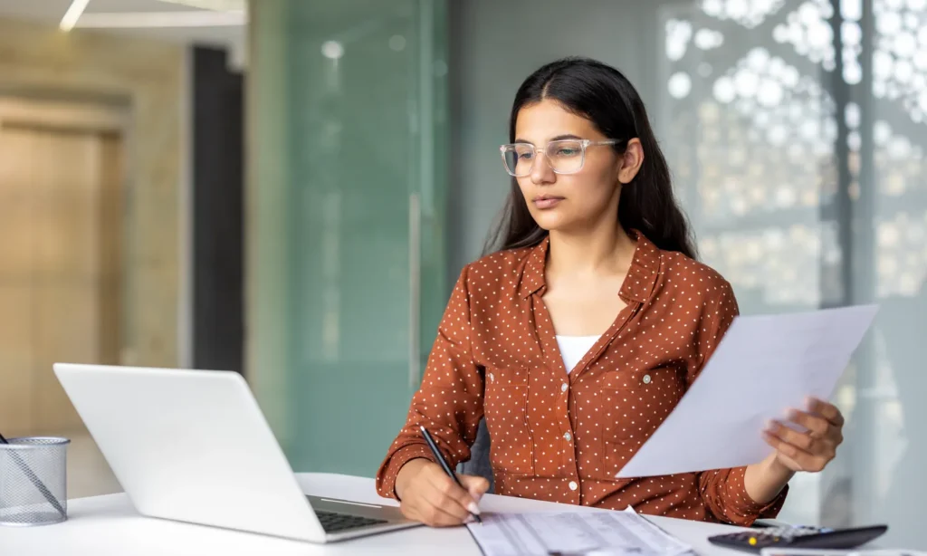 Director reviewing an ATO penalty notice alongside deed of company arrangement paperwork