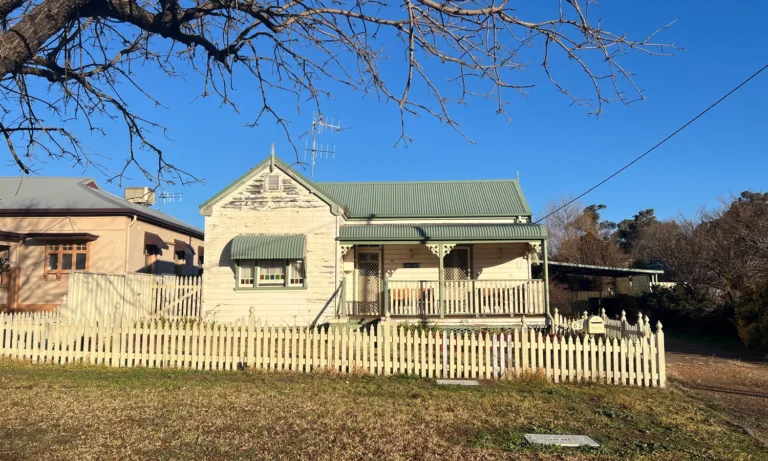 Auction sign outside a Melbourne property reflecting Victoria's new reserve price disclosure rules